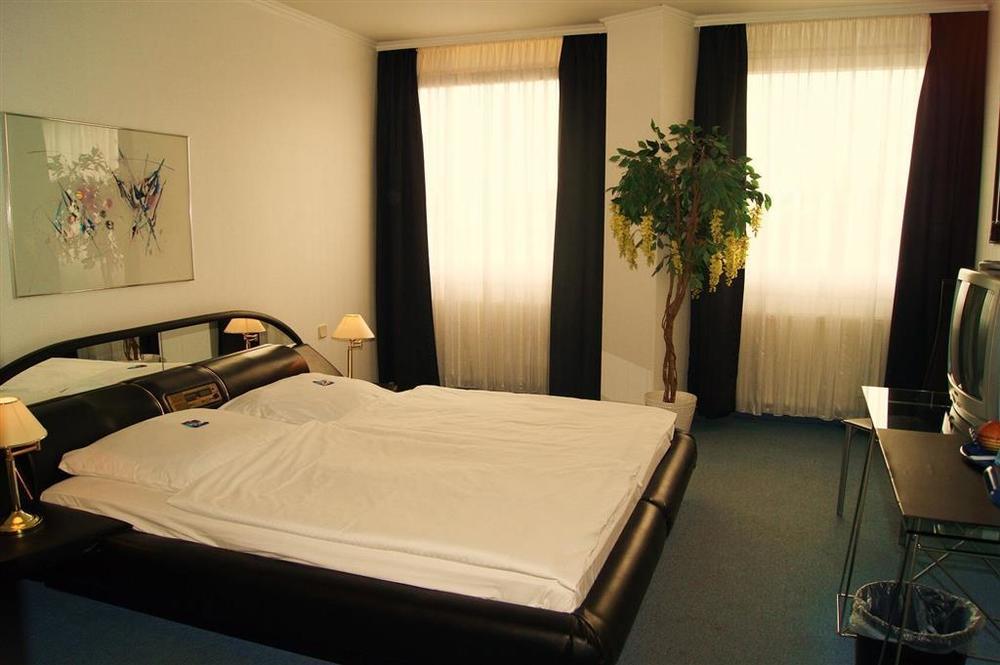 Hotel Berliner Baer Berlim Quarto foto